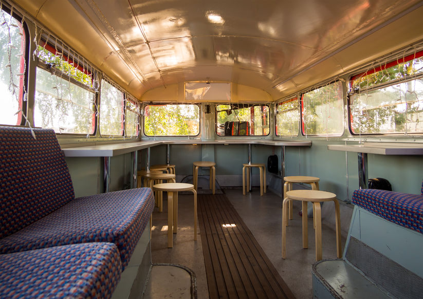 Inside of bus conversion. diner setting.