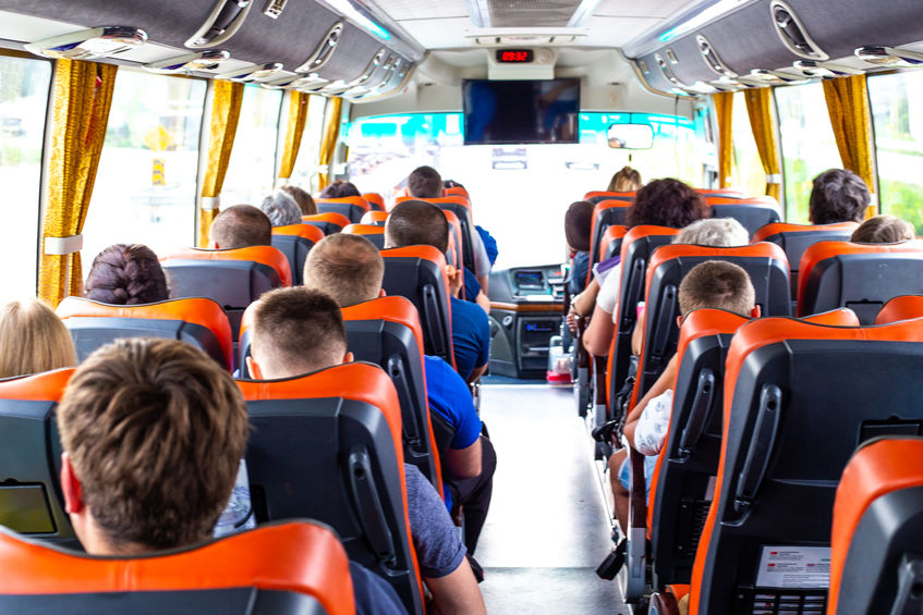 sports team rides a bus to next game